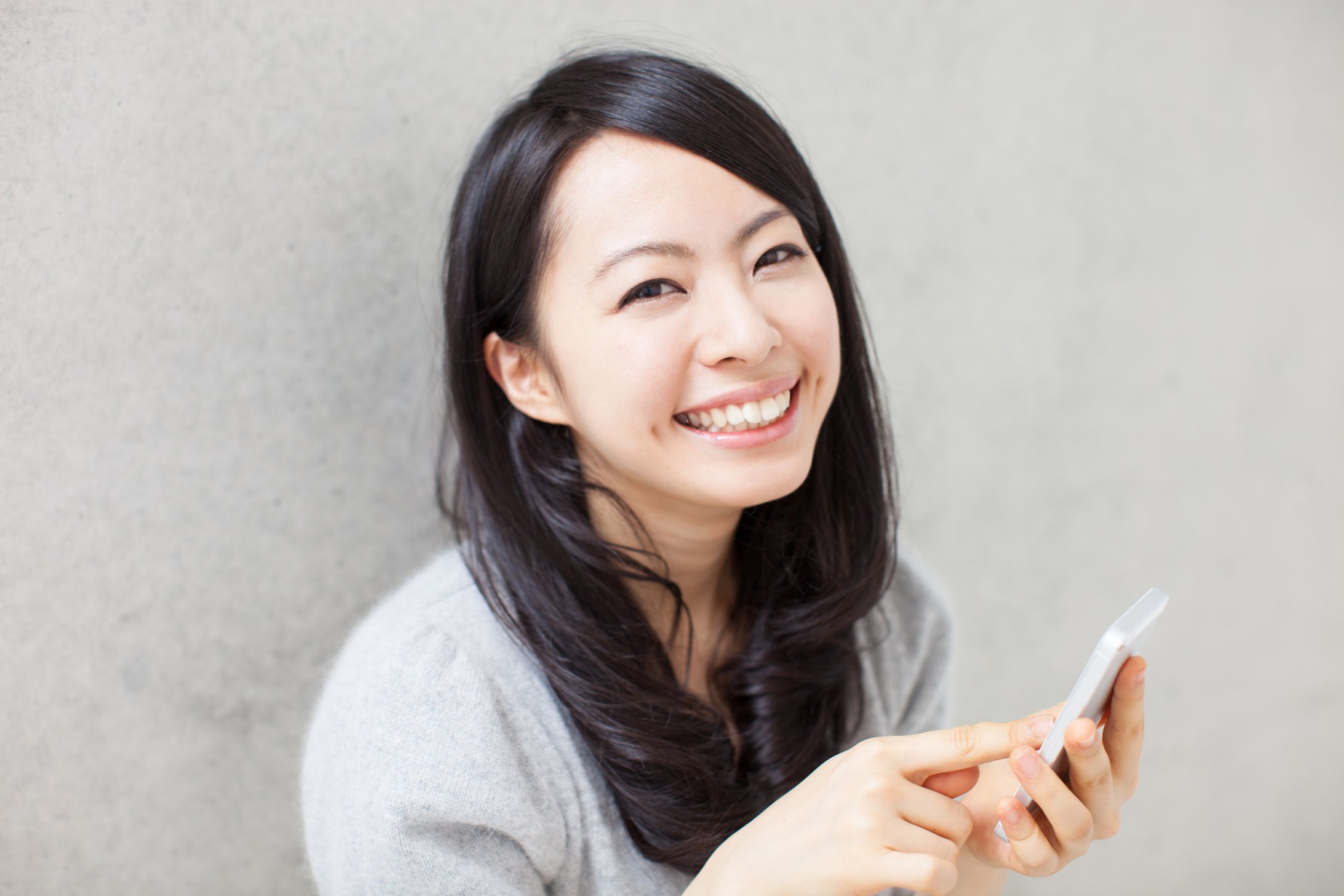 Japanese woman using a smartphone